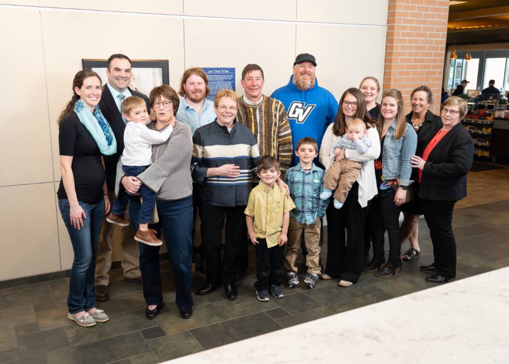 Lynn Blue posing with family at the Lynn M. Blue Connection Naming Ceremony